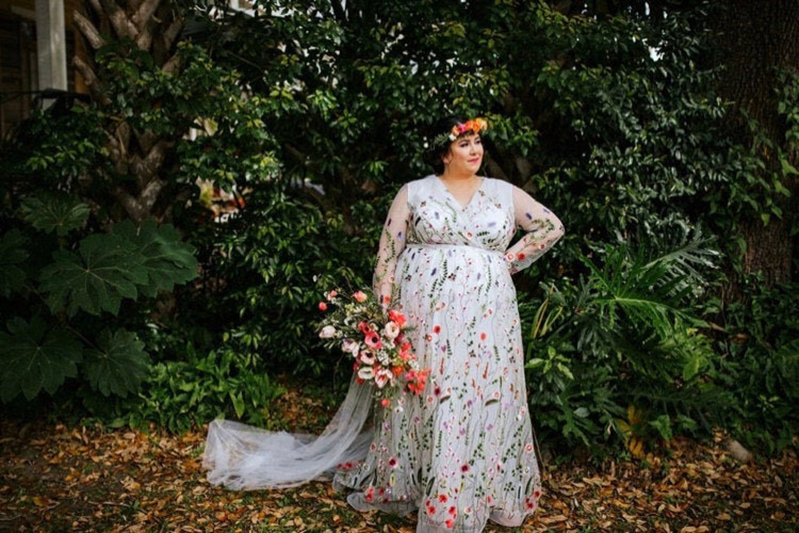 Plus size cruvy unique wedding gown with lace and floral crown