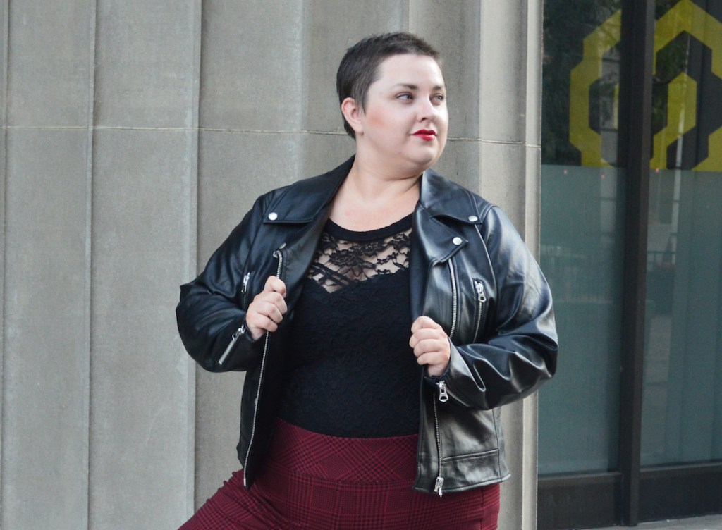 Plus size fashion blogger in black plus size moto jacket from Torrid!