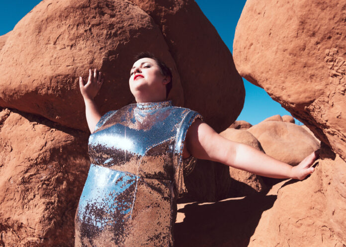 Futuristic space explorer photoshoot in silver plus size model in salt lake city