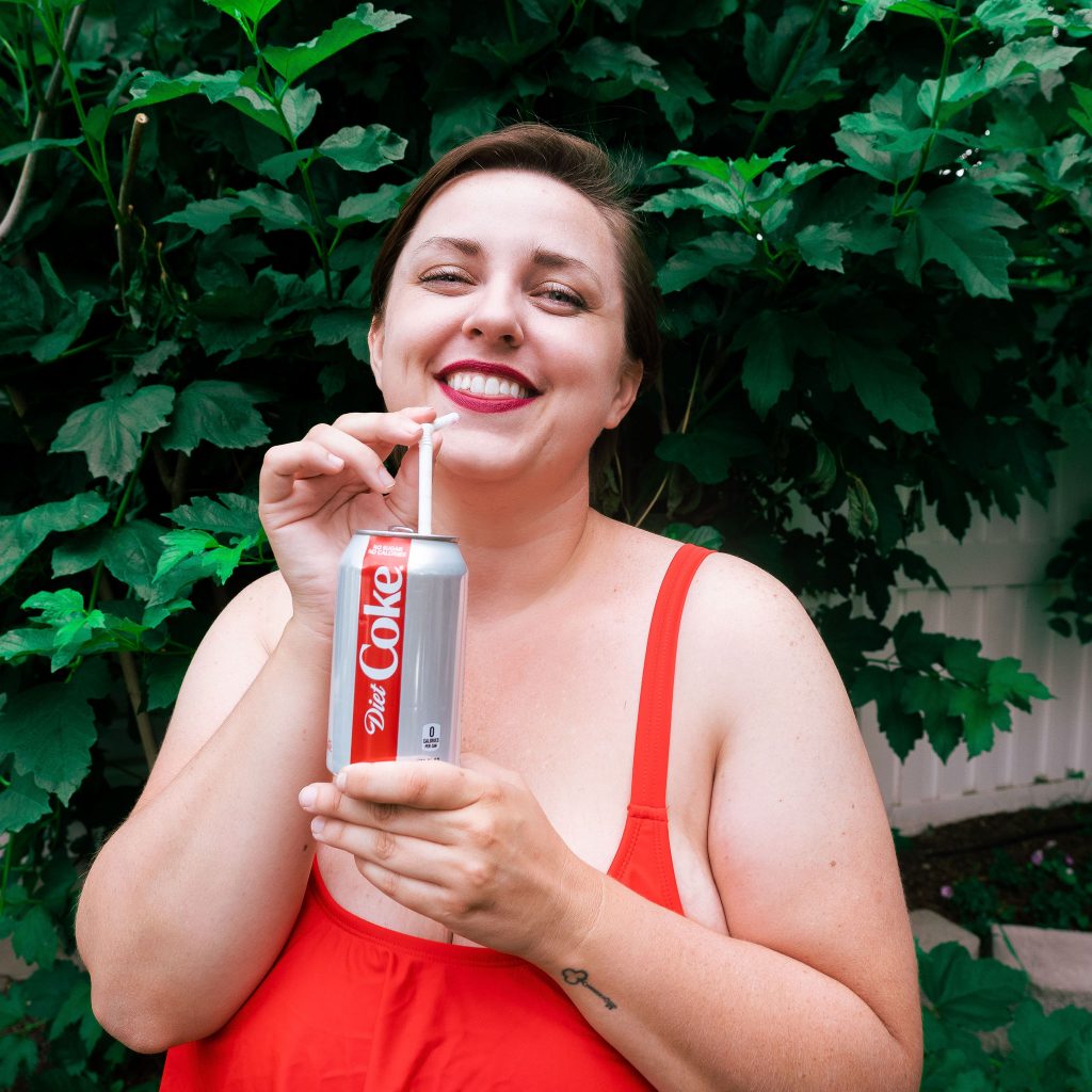 FAshion blogger with Diet Coke in red bikini from Amazon