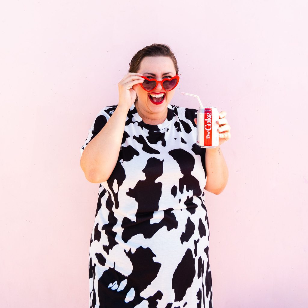 Fashion blogger from Utah in cow print dress trend