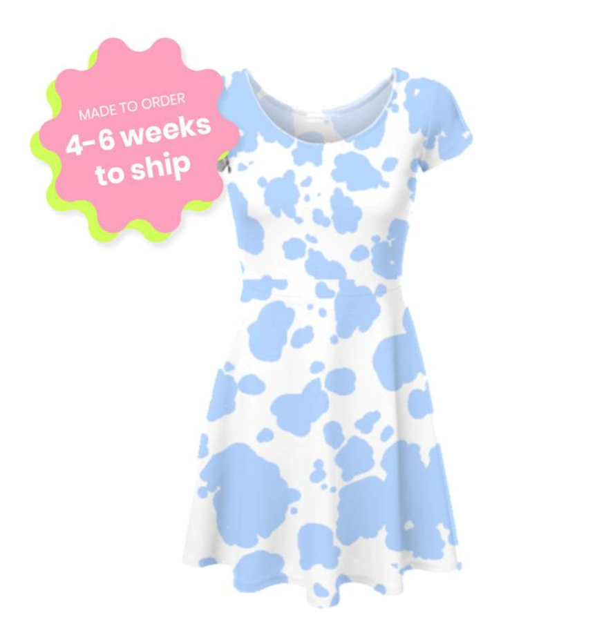 Shopping guide for cow print plus size clothing - image shows kawaii blue cow print skater dress