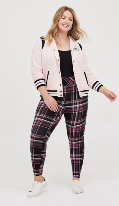 plus size airport outfit with pink jacket and plaid pants in pink and black