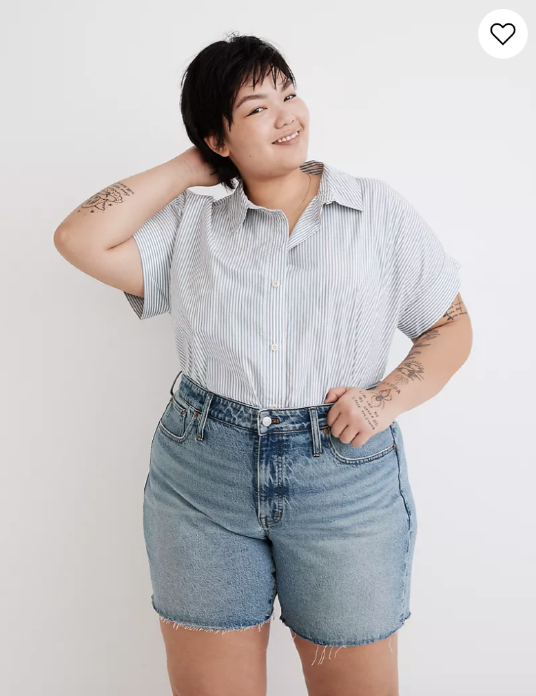 plus size butch outfit button down blue and white shirt with high waist denim cutoff shorts