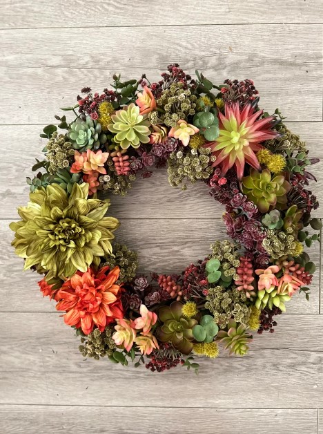 Front Door Wreaths for Summer - wreath made out of succulents and green and pink dahlias