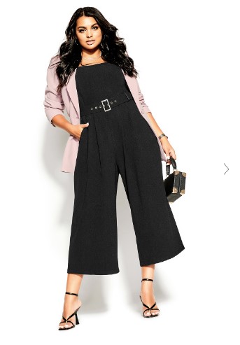 Plus Size Airport Outfit Idea - Chic pink jacket with black fitted jumpsuit from City Chic
